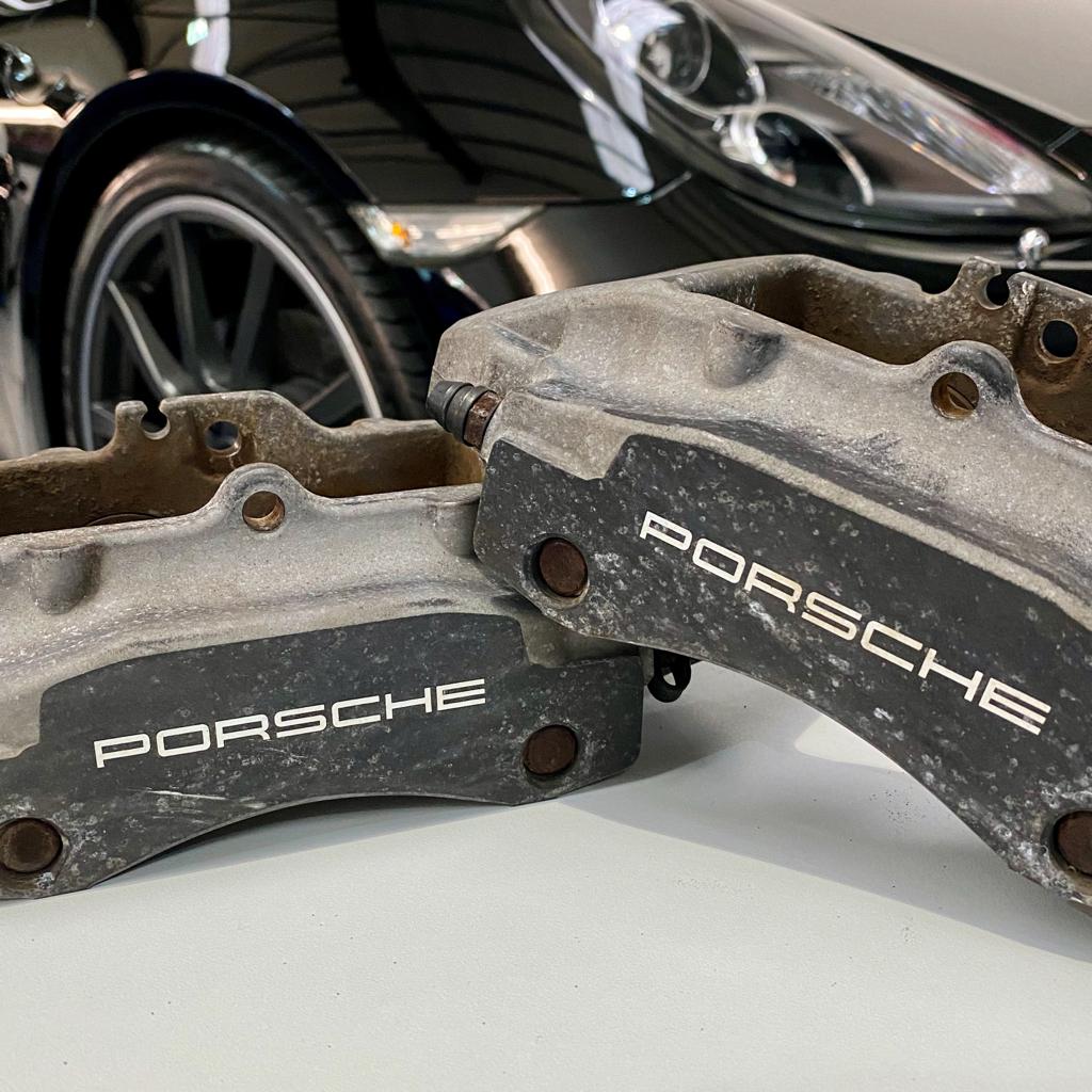 Porsche brake caliper before RPM Specialist Cars